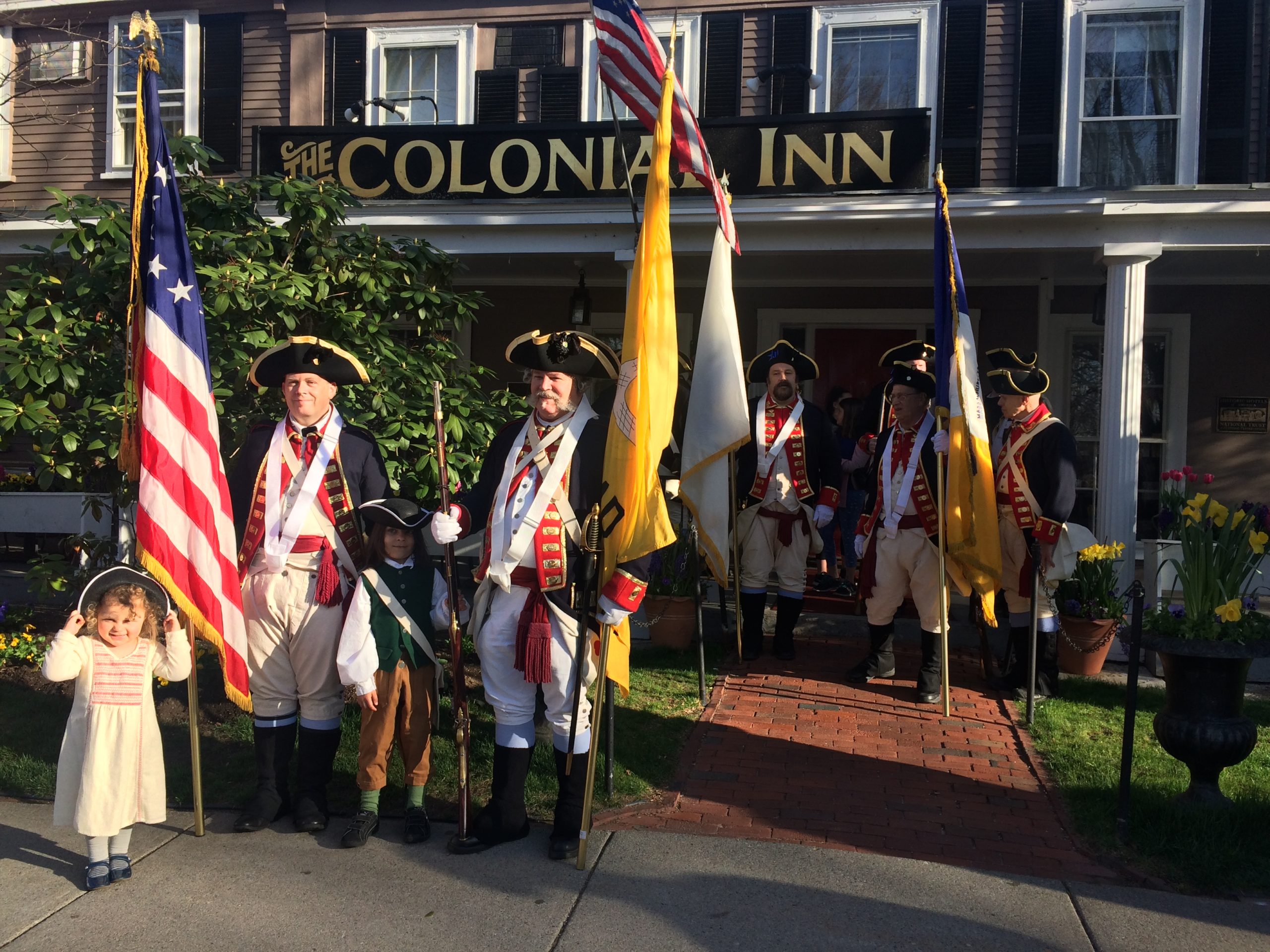 Patriotic men outside Concord's Colonial in Downtown Concord MA