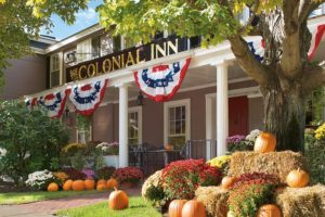 Photo of Concord's Colonial Inn During Autumn's Peak. Click Here for 20 Fall Date Ideas.