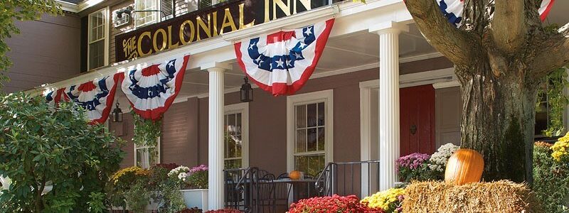 Photo of Concord's Colonial Inn During Autumn's Peak. Click Here for 20 Fall Date Ideas.